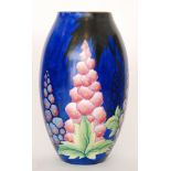Carlton Ware - A 1930s Art Deco Handcraft vase decorated in the Cherry pattern with leaves and