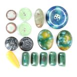 Ruskin Pottery - A collection of assorted roundels and buttons decorated in a variety of colours