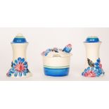 Clarice Cliff - Marguerite - A Muffiner cruet set circa 1933 relief moulded with flowers and