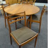 G-Plan Furniture - A model 4395 teak dining table of circular form,