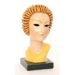 Keramos - A small 1930s Art Deco terracotta bust of a stylised female with ringlet hair, unmarked,