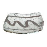 David Frith - A later 20th Century studio pottery square dish raised to four hoop feet,