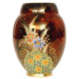 Carlton Ware - A 1930s Art Deco vase decorated in the gilt and enamel Star Flower pattern against a