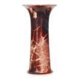 Ruskin Pottery - A high fired lily vase lily vase of flared form decorated with a deep red with