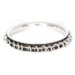 Georg Jensen - A Danish Sterling silver charm bangle,