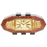Unknown - A 1920s French Art Deco mantle clock of elongated octagonal form in red variegated marble