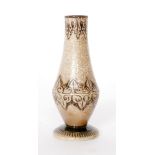 Martin Brothers - A late 19th Century small footed vase decorated with an incised patterned band in