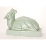 John Skeaping - Wedgwood - A model of a Duiker Lying, glazed in green, impressed marks,