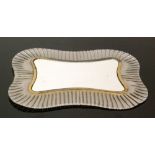 In the manner of Fratelli Toso - A circa 1950s Italian Murano glass wall mirror of shaped form with