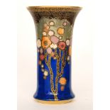 Crown Devon - A 1930s Art Deco vase of flared cylinder form decorated in pattern 2073 with gilt and