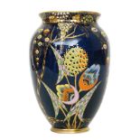 Carlton Ware - A 1930s Art Deco vase of swollen form decorated in the gilt and enamel Devils Copse