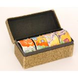 Clarice Cliff - My Garden - A boxed set of four napkin rings relief moulded with flowers and