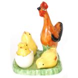 Clarice Cliff - Chick - A novelty condiment set modelled as three chicks, one in an egg,