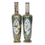 Robert Wallace Martin - Martin Brothers - A pair of late 19th Century footed vases each of tapering