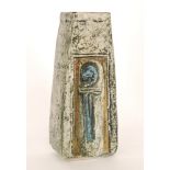 Troika Pottery - A coffin vase decorated to both sides with carved and textured decoration in tones