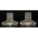 Timo Sarpaneva - Ittala - A pair of clear crystal Bolero candlesticks with a fluted stem rising to