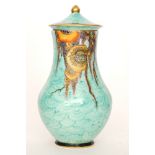 Crown Devon - A 1930s Art Deco vase and cover decorated with gilt and enamel stylised flowers and