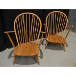 Ercol - A pair of beech 'Windsor' hoop back easy arm chairs, model 203.