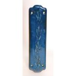 Ruskin Pottery - A door or finger plate of shaped rectangular form decorated in a blue souffle