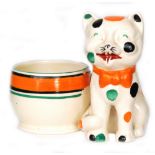 Clarice Cliff - Laughing Cat - A pencil holder modelled as a seated laughing cat wearing a bow tie,