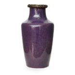 Ruskin Pottery - A vase of high shouldered form decorated in an all over mottled purple souffle