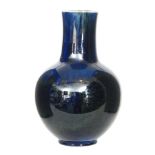 Ruskin Pottery - A large souffle glaze vase of ovoid form with a cylinder neck,