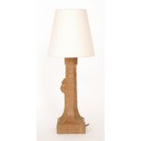 Robert 'Mouseman' Thompson - An oak table lamp of tapered octagonal form in an adzed finish,