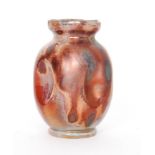 Unknown - An early 20th Century ruby lustre vase of barrel form with indented oval panels to the