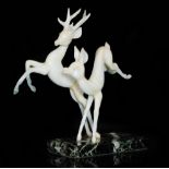 Istvan Komaromy - A figural lamp work group of a leaping stag and deer in tonal white opalescent