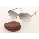 Porsche Design - A pair of circa 1980s Carrera folding sunglasses,