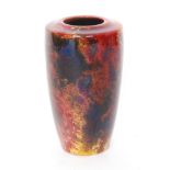 Harry Nixon - Royal Doulton - A 1920s Flambe vase of tapered cylindrical form with a roll rim neck,