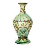 Lizzie Wilkins - Della Robbia - An early 20th Century vase of footed form decorated with incised