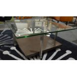 Rolf Benz - A coffee table of square form, the glass upper tier signed to the corner,