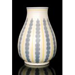 Poole Pottery - A 1950s Freeform shape 337 baluster vase decorated in the YES pattern,