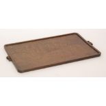 Robert 'Mouseman' Thompson - An oak serving tray of rounded rectangular form,
