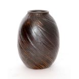 Martin Brothers - An early 20th Century miniature vase of barrel form,