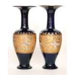 Royal Doulton - A large pair of Chine Ware vases of footed shouldered ovoid form with flared collar
