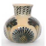 Martin Brothers - A late 19th Century vase of ovoid form with a squat flared neck,