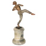 Bruno Zach - A small Art Deco cold painted bronze figure of a lady wearing pantaloons trousers in a