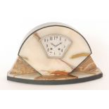 A French Art Deco black and onyx clock garniture of arch form with eight day striking movement and