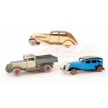 A tinplate three tone clockwork brown sedan car 90-CR-1001, length 35cm,