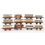 A Hornby O gauge 0-4-0 LMS tank locomotive 2270 in maroon livery, also three LMS corridor coaches,