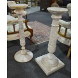 A white marble pedestal with a turned gun barrel shaped support over a square base, height 76cm,