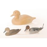 A plain decoy duck by Sophie Ridges, width 27cm, two similar ducks by Jan Fitch,