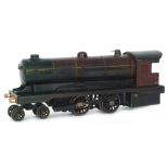 A Bowman O gauge 4-4-0 spirit fired locomotive in maroon livery,