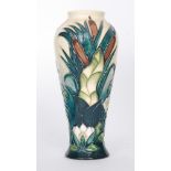A Moorcroft Pottery vase of inverted baluster form decorated in the Lamia pattern designed by