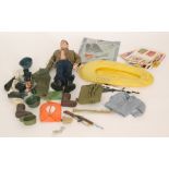 An Action Man 1964 Palitoy doll with uniforms and frogman's equipment, life raft etc,