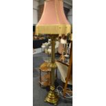 A brass ecclesiastical style standard lamp,
