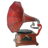 A Malaya wind up horn gramophone 'The Crown' with red painted tinplate horn No 107 on a mahogany