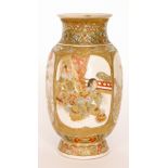 A late 19th Century Japanese Meiji period Satsuma vase decorated with four panel scenes,